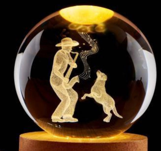 Person playing the saxophone for a dog-3D crystal ball night light featuring a laser-engraved
