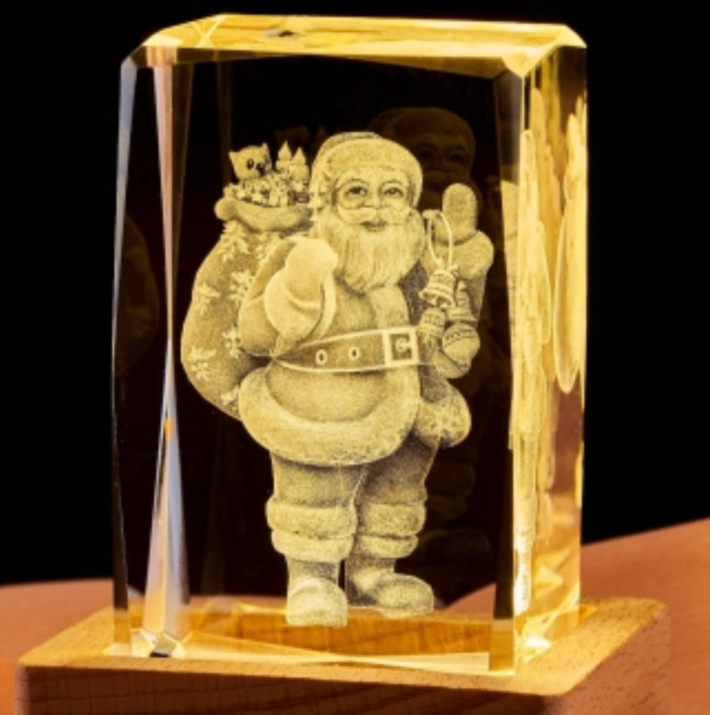 Santa Claus -3D laser-etched crystal sculpture, often sold as a paperweight or a collectible holiday decoration